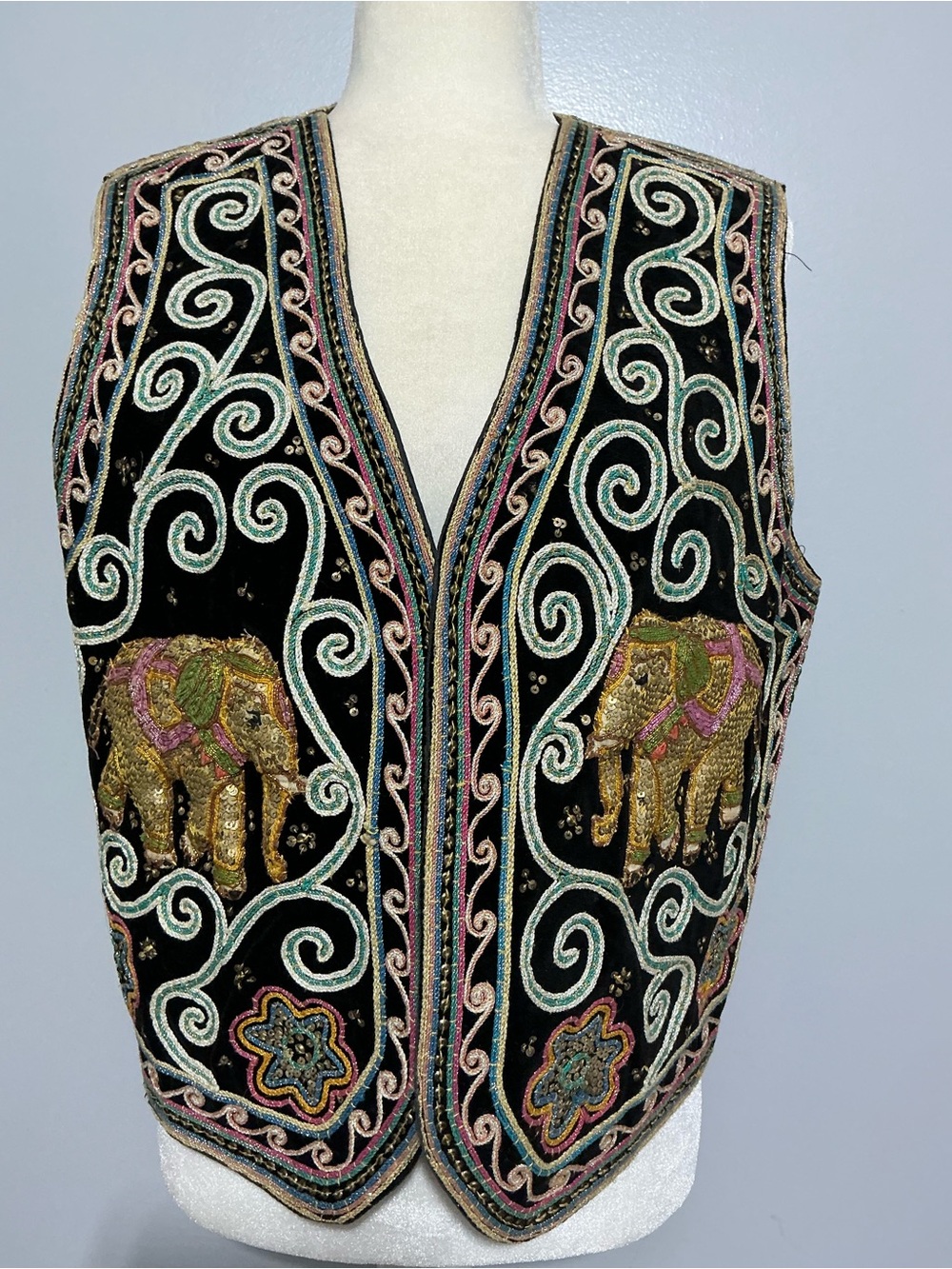 Carol Horn Workshop black vest features 3D embroidered and sequined elephants